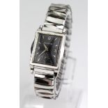 Gents Bulova wristwatch circa 1953. The square black dial with silvered arabic/baton markers &