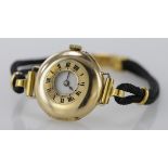 Ladies 15ct cased half hunter fob watch made into a wristwatch. Imports marks for London 1913.