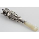 Silver owl & mother of pearl handled baby's teether. Silver hallmarked C&N Birm. 1928. Total