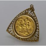 Victorian Sovereign 1901 perth mint in a 9ct triangular shaped pendant mount. Total weight 12.4g