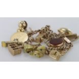 9ct charm bracelet with a good variety of charms attached, total weight 51.1g