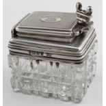 Inkwell. Silver and cut glass travel inkwell, engine turned lid with crest & initials, hinged lid