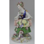 Continental porcelain figurine, depicting a classical female holding a hat, circa 19th Century,
