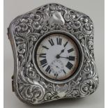 Silver mounted clock with plated Goliath watch ( watch appears to be working at the moment).