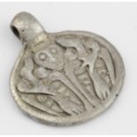 Viking scadinavian circa 900 AD silver pendant depicting god Odin gripping ravens, 20mm
