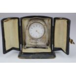 Small silver fronted mantle clock, hallmarked 'D.N.H.&S, Birmingham 1905', in need of restoration,