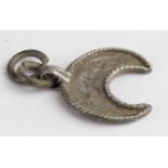Viking circa 900 AD silver lunar pendant with loop, 15mm
