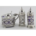 Silver three piece cruet set, mustard, salt & pepper plus two glass liners, hallmarked Chester,