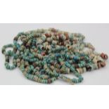 Two Egyptian bead necklaces, consisting of multicoloured beads, length 86cm & 56cm approx.