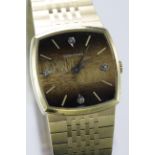 Gents Longines manual wind gold plated wristwatch. The square gilt / brick effect dial with