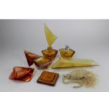 Eight pieces of orange glass by EB Iser Kristall, including perfume bottle etc.