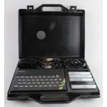 Sinclair ZX Spectrum, with original instructions etc., in a carry case (untested, sold as seen)