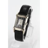 Gents Bulova 10kt gold filled "Excellency" wristwatch. The square black / silver two tone dial