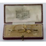 9ct gold dragon fly brooch with blue gemstone and seed pearls, total weight 4.5g. Boxed