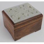 Trinket box,with carved decoration to lid (possibly jade), height 60mm, width 85mm, depth 70mm