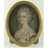 Pastel. An oval pastel portrait depicting a blue eyed woman, circa early 20th Century, unsigned,
