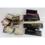 A collection of drawing sets & glass slides, slides depict Lowestoft, USA, Jersey, Ashford, etc.