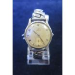 Gents stainless steel cased Omega wristwatch circa 1940. The cream dial with arabic numerals and