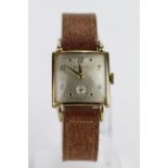 Gents Bulova 10kt gold filled wristwatch circa 1948. The square cream dial with arabic / square