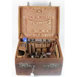 Gentlemans large leather vanity / dressing travel case, containing several silver topped glass