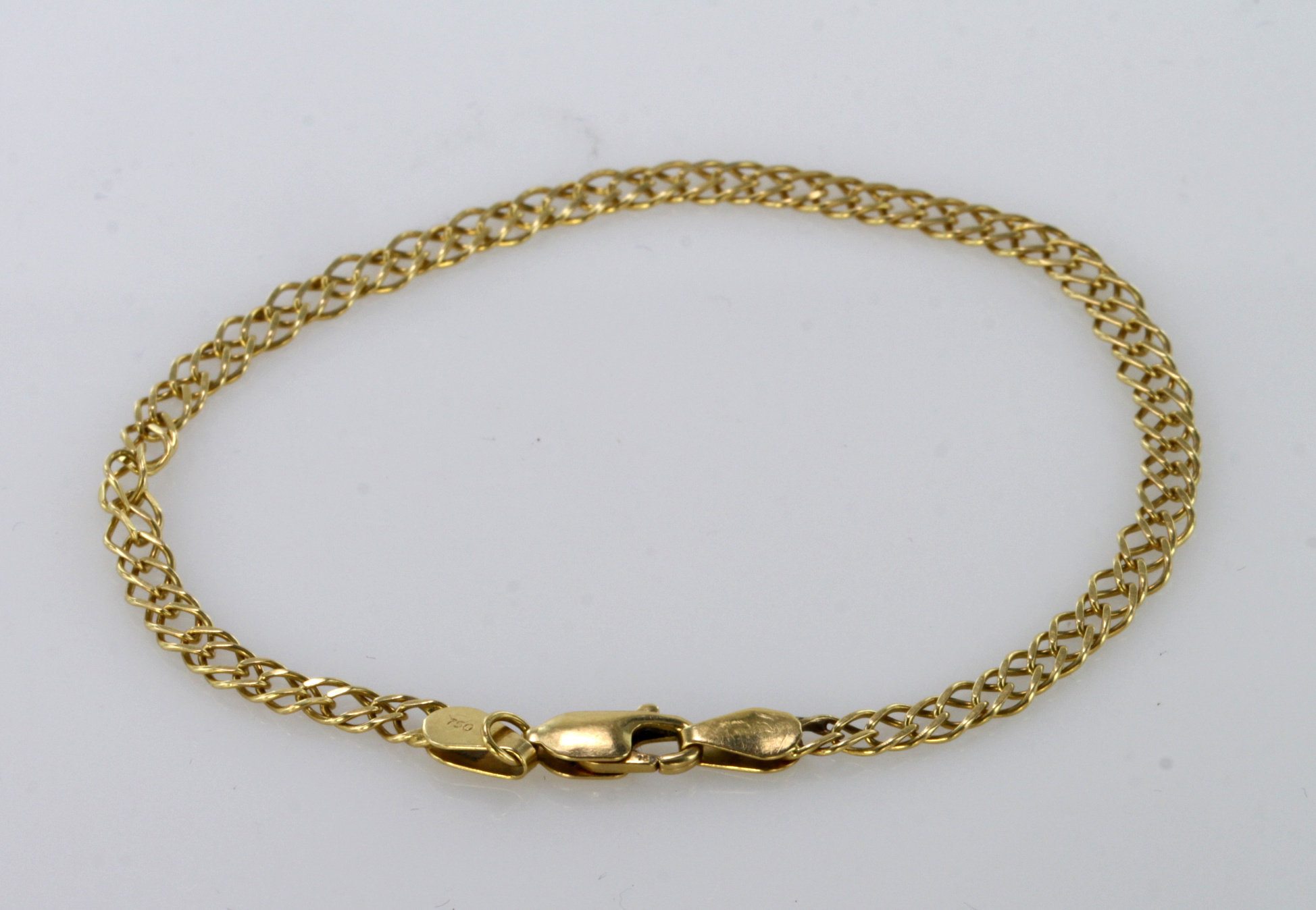 18ct yellow gold curb link bracelet, weight 3.1g