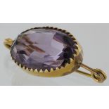 Yellow metal, tested as 15ct gold, single oval amethyst brooch, weight 6.9g