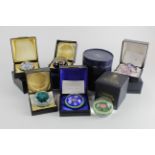 Paperweights. A collection of eleven boxed paperweights, makers include Whitefriars, Perthshire