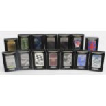 Zippo. A collection of fourteen Zippo lighters, each contained in original case