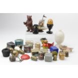 Thimble cases. A collection of approximately twenty-five thimble cases, including acorn, light bulb,