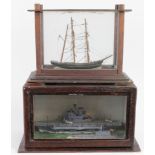 Two wooden model ships, circa early to mid 20th Century, one depicts H.M.S. Ark Royal, the other