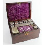 Victorian mahogany vanity case / box, containing numerous glass bottles (some with silver plated
