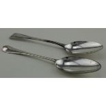 Two silver tablespoons comprising 1 Hanoverian pattern c 1760 -1780 (worn marks) and 1 Old English