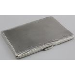 Engine turned silver cigarette case hallmarked SJR Birm. 1965. Weighs 5oz.