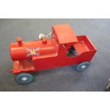Wooden toy train pedal car, red with blue wheels, label to side of boiler depicting the Union Jack