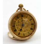 Ladies 14ct cased fob watch, the gilt dial with black roman numerals and foliage decoration.