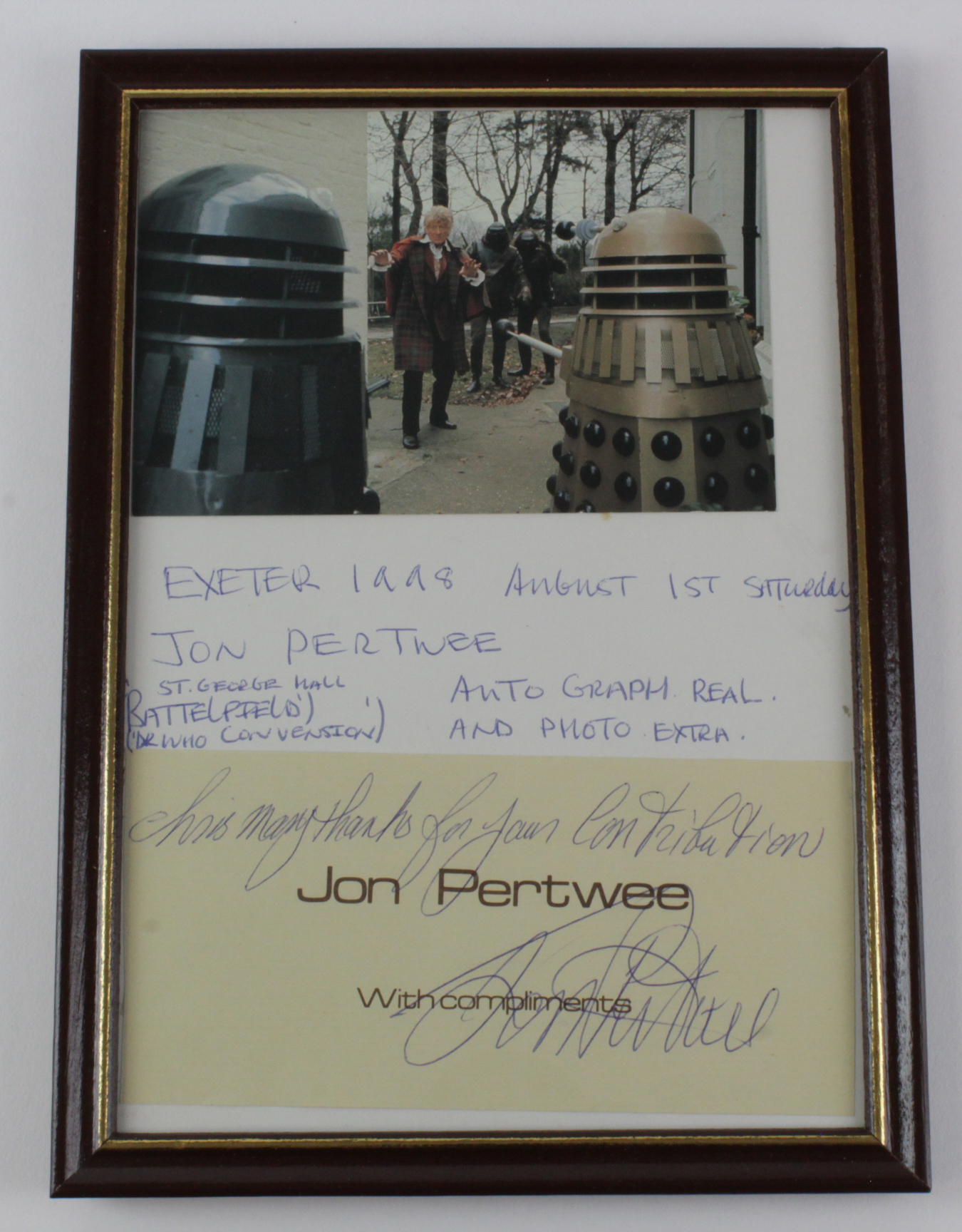 BBC Third Doctor Who, Jon Pertwee Signed compliment slip with studio photograph in a glazed frame