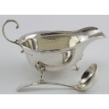 Silver sauce boat & Old English pattern ladle both hallmarked GM & S. One is Birm. 1936 the other is