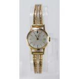 Ladies 9ct gold Girard Perregaux Wristwatch on a 9ct bracelet, watch working when catalogued,