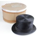 Black top hat, circa early 20th Century, with original owners name inside (John Thomas), contained