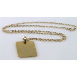 Yellow metal (tests as 18ct Gold) rectangular pendant on a 9ct Gold chain, pendant weight 7.4g