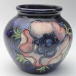 Moorcroft pottery small vase, with floral decoration, height 7.5cm approx.