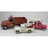Tonka Toys. Three pressed steel Tonka Toys, circa 1960s, comprising Hydraulic Dump Truck, Tow Pickup