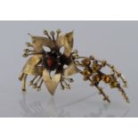 9ct yellow gold floral spray brooch set with garnet and citrine, weight 9.8g