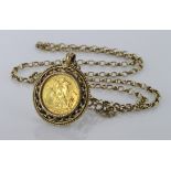 Edward VII gold sovereign in a pendant mount on a 9ct chain. Total weight 24.2g