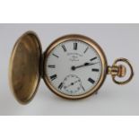 Gents gold plated hunter pocket watch in the "Star" case. The white dial signed "International" with