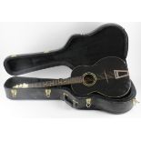 G. B. Walters black acoustic guitar, circa 1940s, contained in a fitted case
