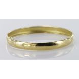 Ladies yellow metal (tests as18ct) bangle, approx 66mm dia, weight 10.5g