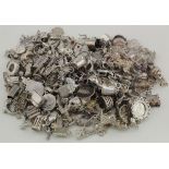 Good variety of silver charms (approx 500g)