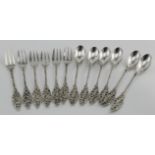 Twelve pieces of Dutch silver flatware comprising six small 830 grade forks & six 833 grade tea