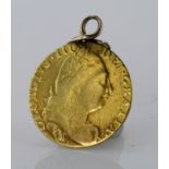 George III guinea dated 1774 with loop mount attached